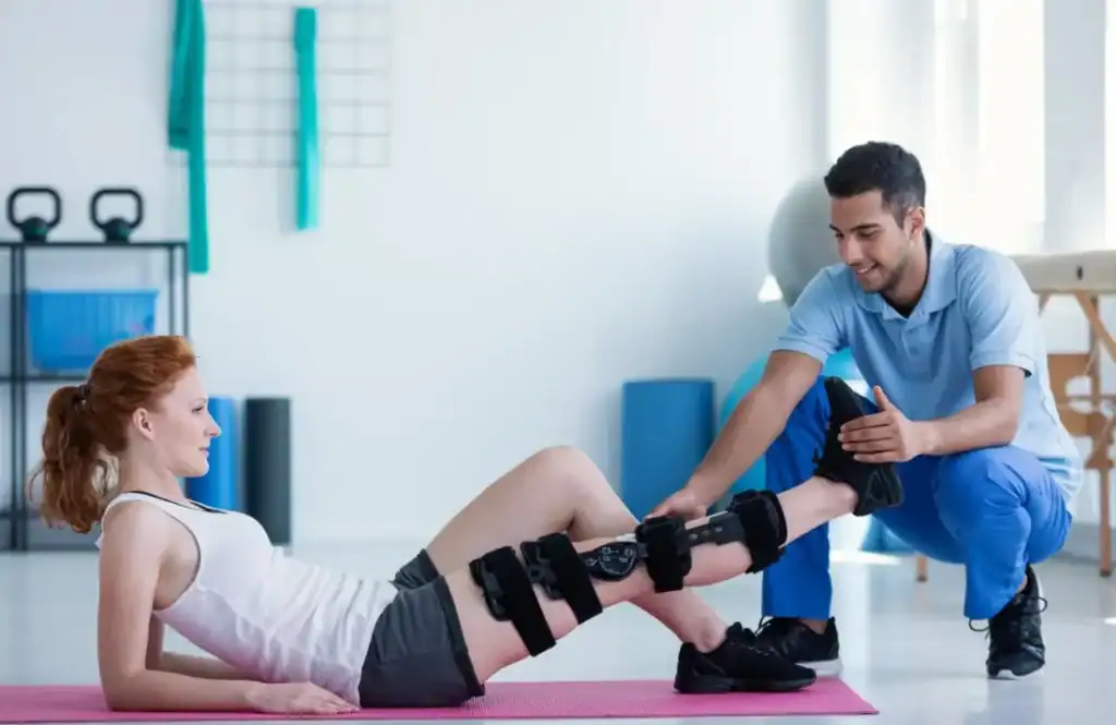 Woman having treatment to help muscle recovery Bridport after an injury