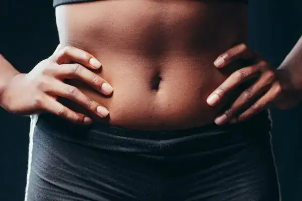 Toning Your Stomach: The Ultimate Guide to Achieving a Sculpted Stomach While Shedding Pounds 1 Image of a toned stomach after non surgical treatment Bridport